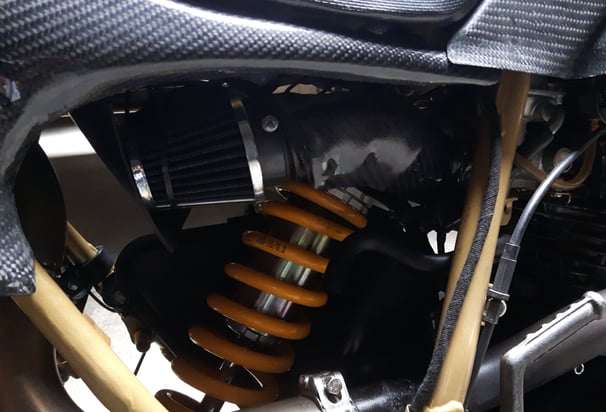 Dedicated suspension and a carbon filter tube.