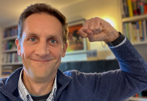 Marcus clenching fist being strong/brave
