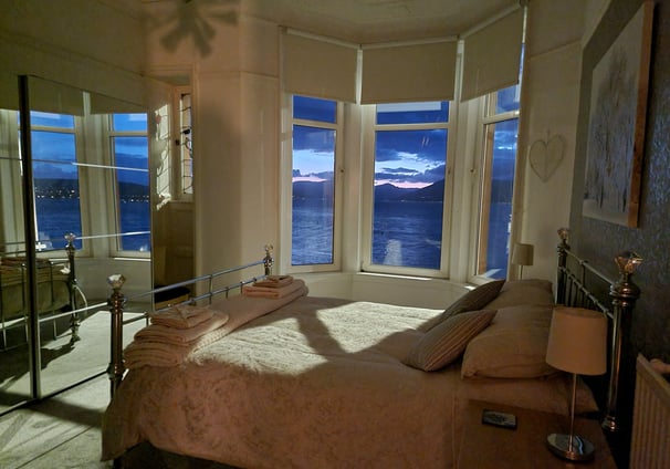 A large bedroom at Gourock Seaview Holiday Let with a view of the sea