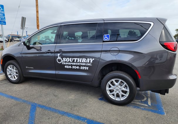 a car parked in a parking lot with a sign that says south bay