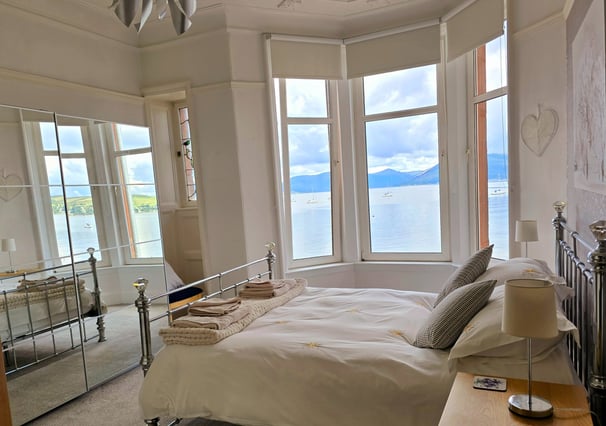 A large bedroom at Gourock Seaview Holiday Let with a view of the sea