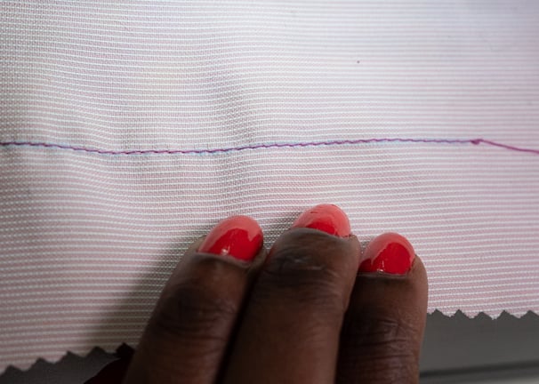 Straight stitch on pink fabric
