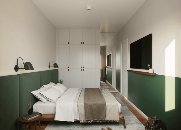 Diseño Interior de habitación pequeña. Placard blanco, respaldar verde, cama con textiles variados.