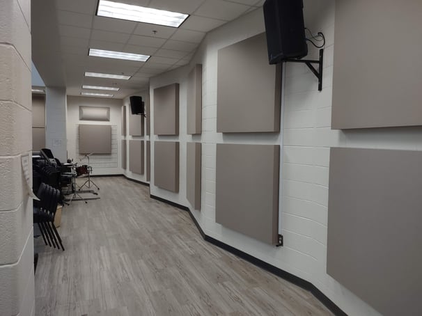 a room with a television and a television