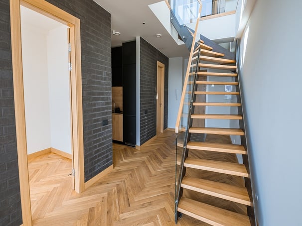 a staircase leading to a second floor bedroom