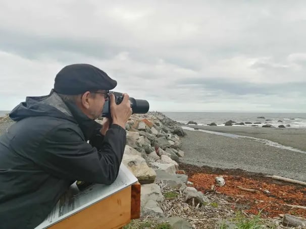 Photographe près du fleuve St-Laurent.