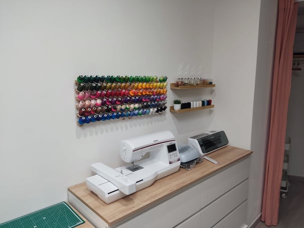 a sewing machine sitting on a counter top