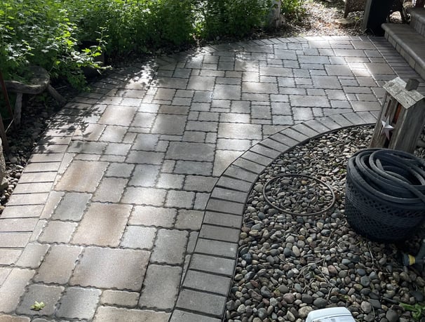 A clean paver walkway after being professionally power washed