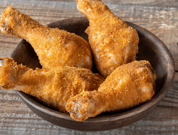 a bowl of crispy baked chicken drums