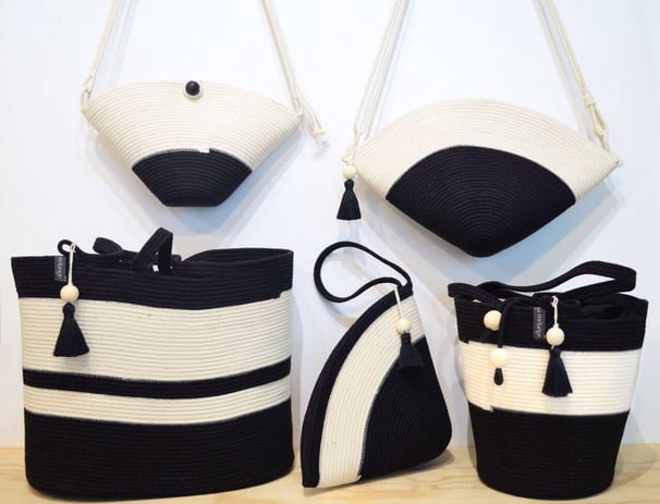 a collection of handmade handmade bags and purses