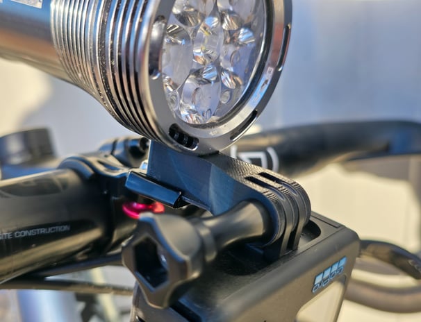 Duo Mount on the bike with gopro and exposure light mounted on it