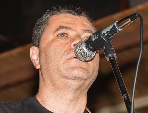 a man with a microphone and a microphone