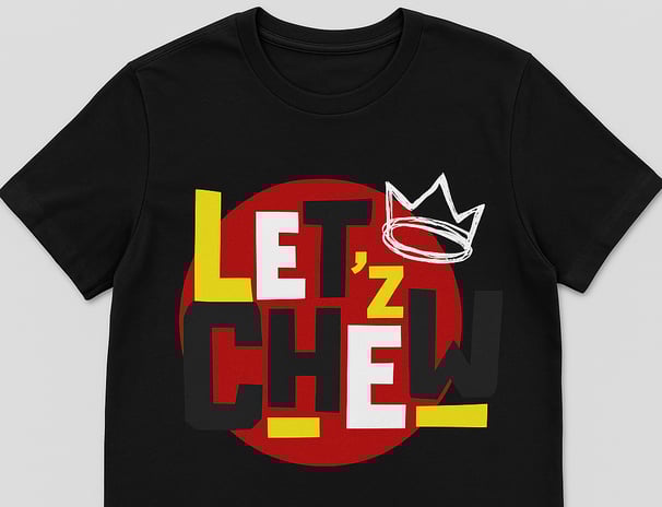 a black t - shirt with a crown on it