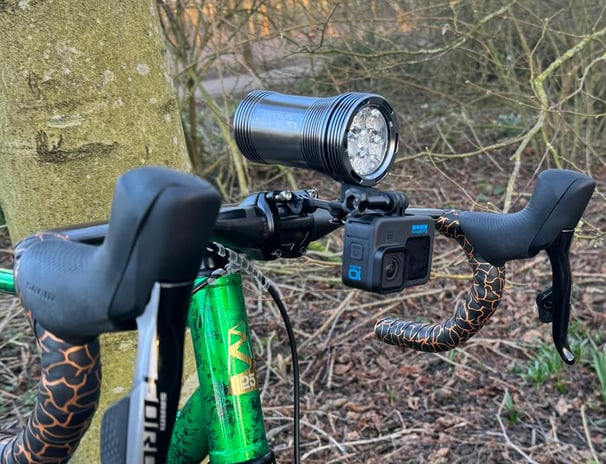a bicycle with a green bike in the woods