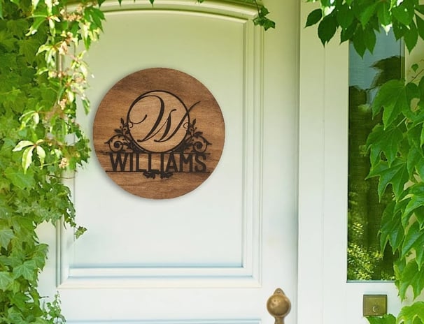 a wooden door with a wooden sign that says william william