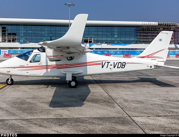 a small plane sitting on a tarmac