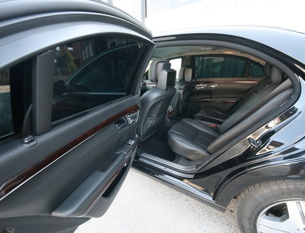 Interior and open door of VR10 armored vehicle, showcasing luxury and maximum ballistic protection.