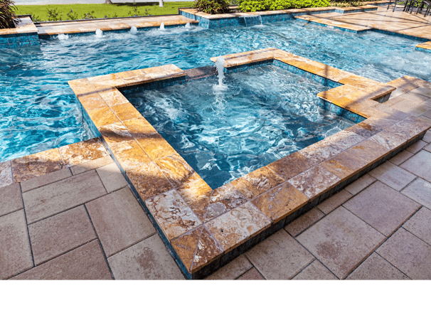 Pool and spa combo pool with tile and paver decking