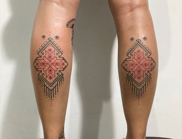 An handpoked tattoo featuring art ornaments songket melayu motive star pattern inspired