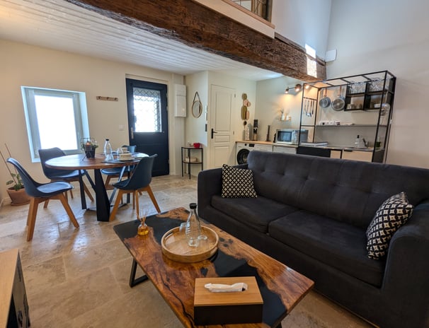 a living room with a couch and a table