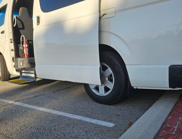 Inclusive airport transport in a 14-seater maxi van with accessibility support