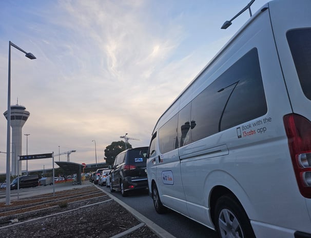 Trusted 14-seater maxi cab for airport transfers with professional drivers