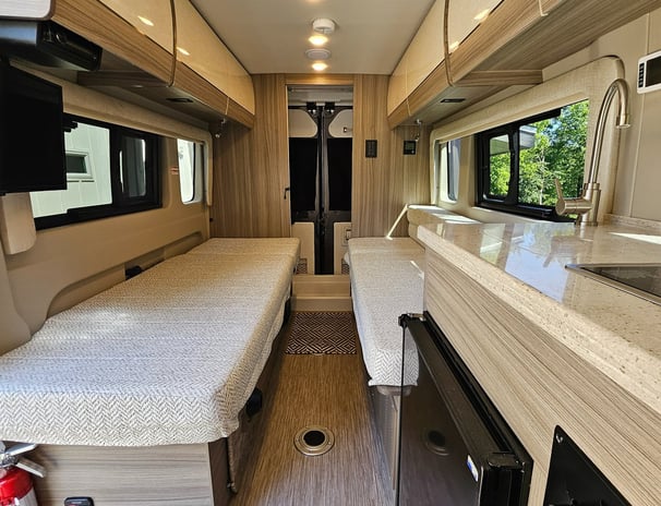 Sleeping area of barely used 2023 Entegra Coach Ethos 20T Class B RV for sale.