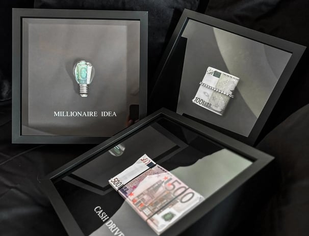 a frame with money and a frame for motivation