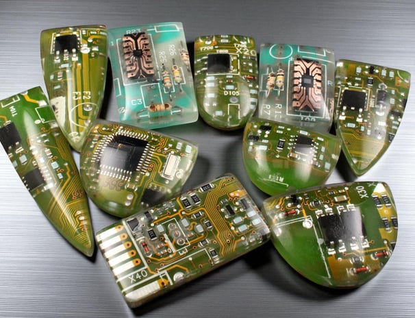 a selection of circuit board cabochons of various shapes to be used by jewellery artists