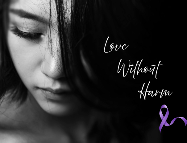 Woman looking down Love Without Harm with Domestic Violence Ribbon