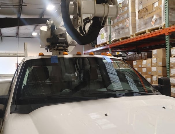 Service vehicle with a new windshield