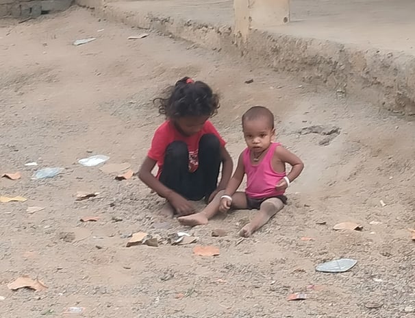 Children is playing with sand