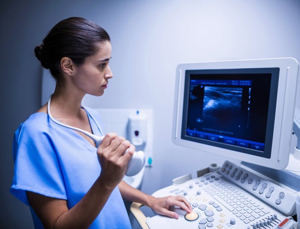 Nurse using ultrasonic device