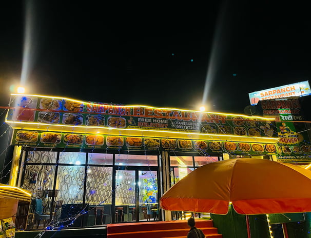 a restaurant with a large open air condition in Sarpanch Restaurant Bareilly Fatehganj