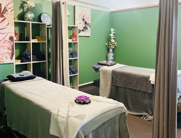 Clean and peaceful massage room at Ashburton Thai Massage & Spa with traditional Thai decor