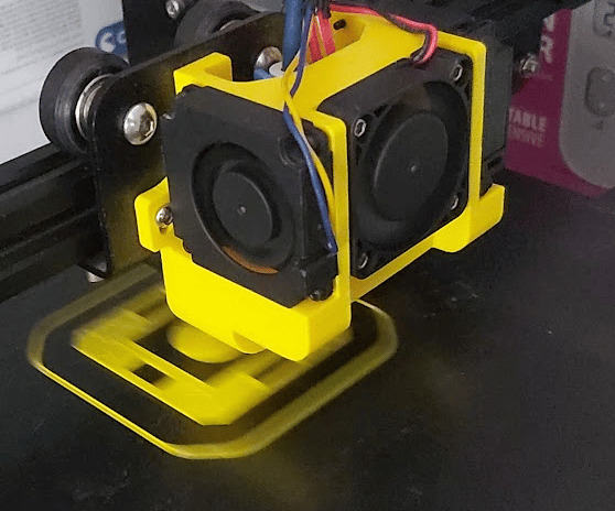 Modified 3D printer hard at work printing products