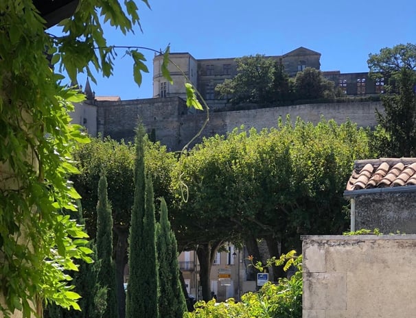 a building with a tower in the background