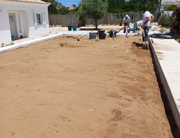 people working on a garden