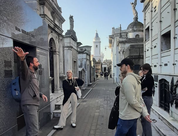 Esteban guiding a small group through Recoleta Cemetery on an English-speaking tour