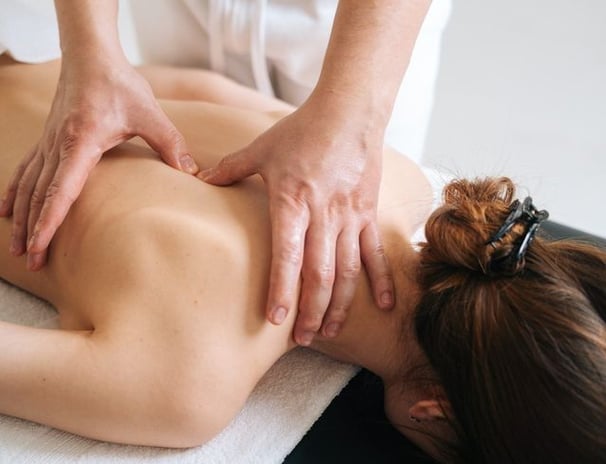 a woman is shown in a massager