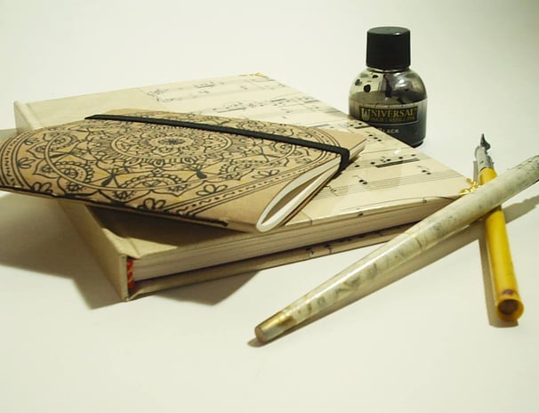 a pen and ink pen on a desk