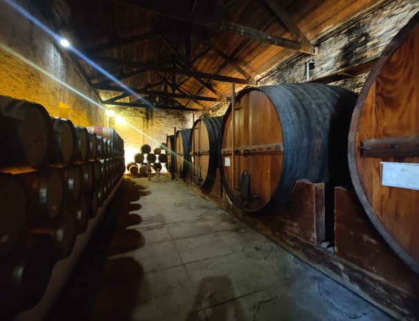 a bunch of barrels stacked on top of each other