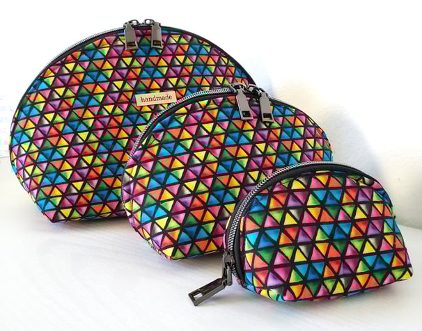 a pair of colorful bags with a triangle shaped design