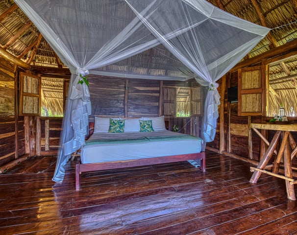 kingsize bed wooden bungalow