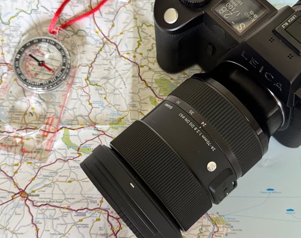 Leica SL2, compass and map of Spain