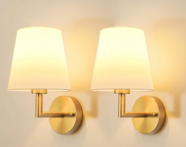 gold sconces with cream and linen lampshade the lamp is a neutral battery powered wall sconces