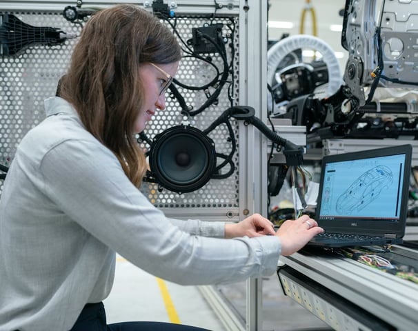 Engineer designing parts in a lab.