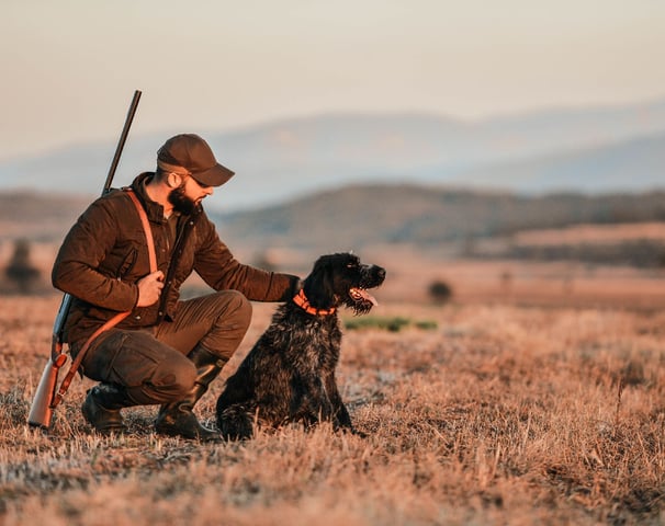 Hunter wearing a hunting nato style watch band for his hunting tactical watch.