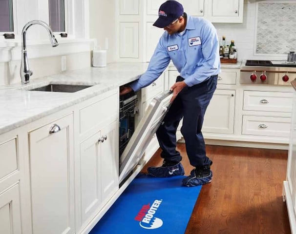 Plumber Checking Dishwasher