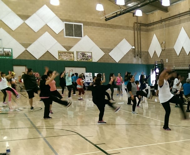 Enhancing Forward Action Inc. image of a group yoga